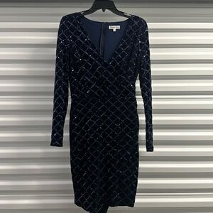 Gently used holiday/party dress soft material.